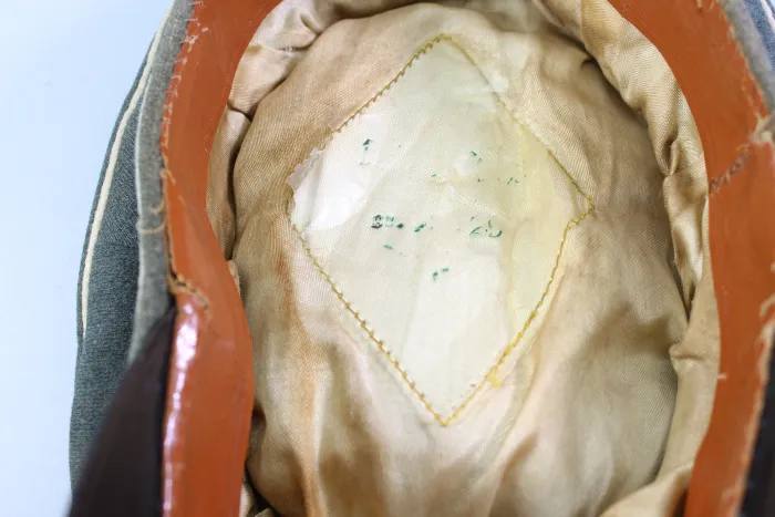 Early peaked cap for infantry officers, so-called "crumpled cap," circa 1940.