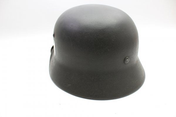 Wehrmacht M 40 EF 66/21478 steel helmet with wearer's name and a badge in top condition