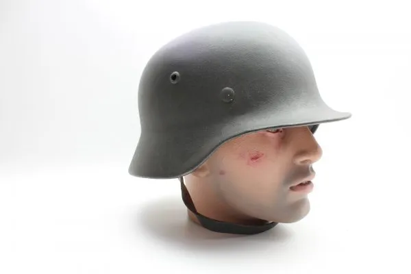 Wehrmacht M 40 EF 66/21478 steel helmet with wearer's name and a badge in top condition