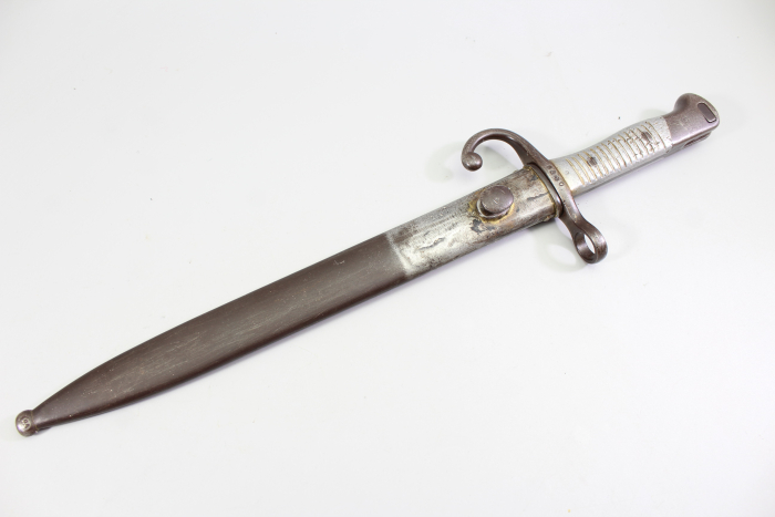 Short edged weapon – Argentine Model 1891 bayonet (WKC) with matching scabbard.