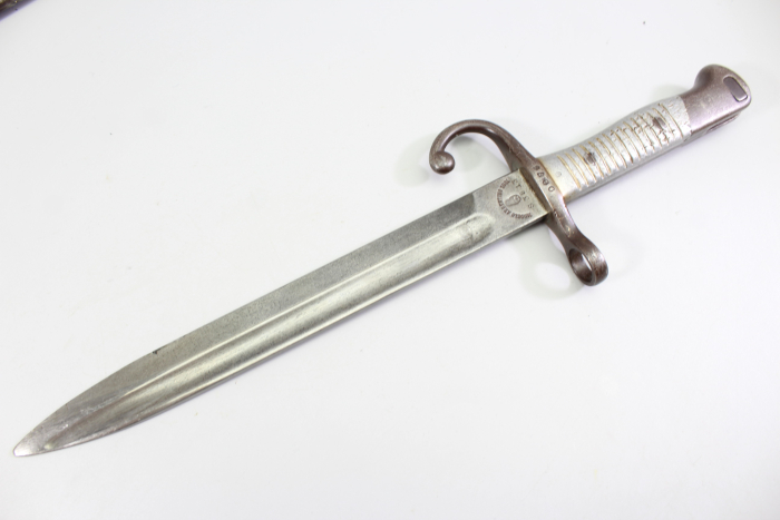 Short edged weapon – Argentine Model 1891 bayonet (WKC) with matching scabbard.