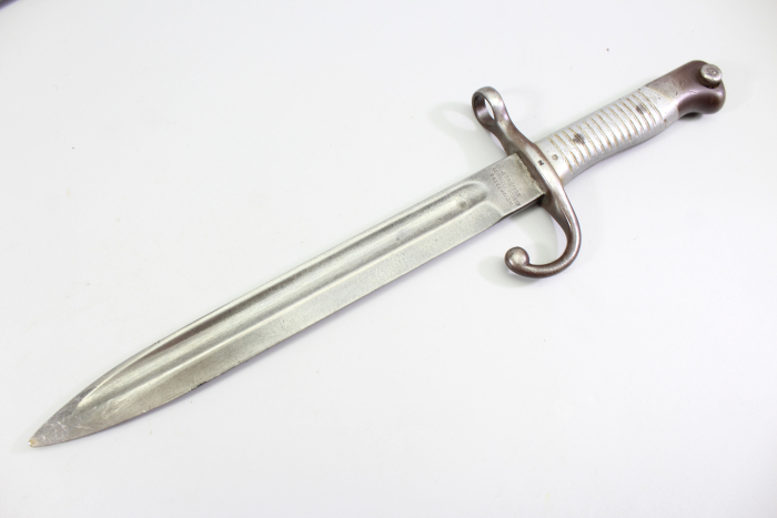 Short edged weapon – Argentine Model 1891 bayonet (WKC) with matching scabbard.