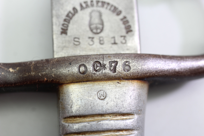 Short edged weapon – Argentine Model 1891 bayonet (WKC) with matching scabbard.