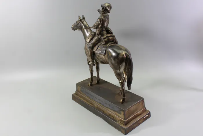 Original sculpture of a mounted German Wehrmacht cavalry soldier with steel helmet and equipment; inscribed "In memory of my service 1924–1938"