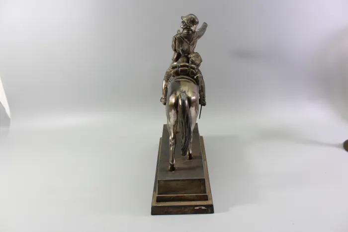 Original sculpture of a mounted German Wehrmacht cavalry soldier with steel helmet and equipment; inscribed "In memory of my service 1924–1938"
