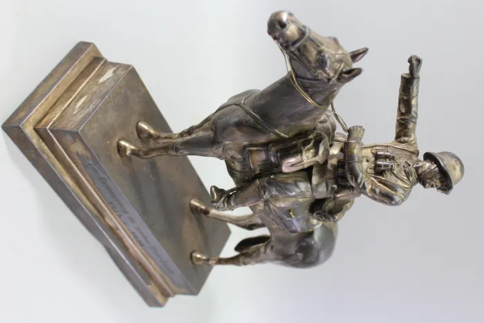 Original sculpture of a mounted German Wehrmacht cavalry soldier with steel helmet and equipment; inscribed "In memory of my service 1924–1938"