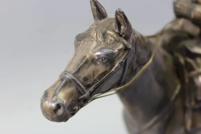 Original sculpture of a mounted German Wehrmacht cavalry soldier with steel helmet and equipment; inscribed "In memory of my service 1924–1938"