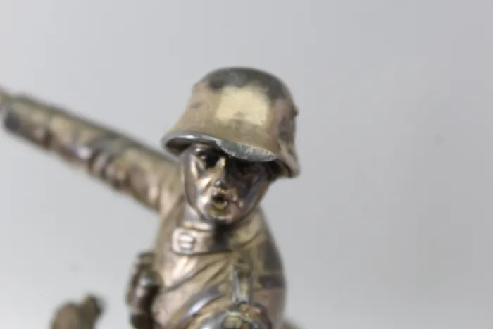 Original sculpture of a mounted German Wehrmacht cavalry soldier with steel helmet and equipment; inscribed "In memory of my service 1924–1938"