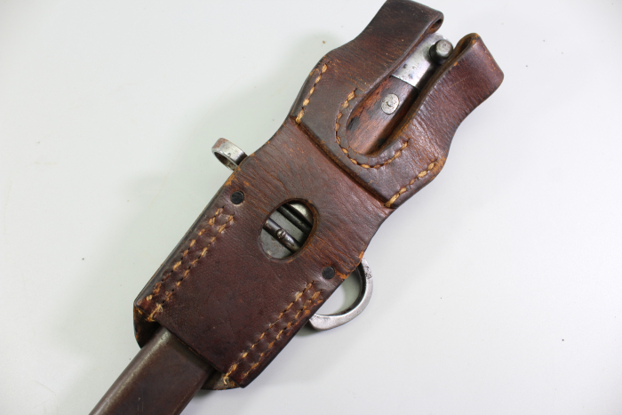 Japanese Type 30 bayonet for Arisaka rifles, complete with frog (belt hanger).