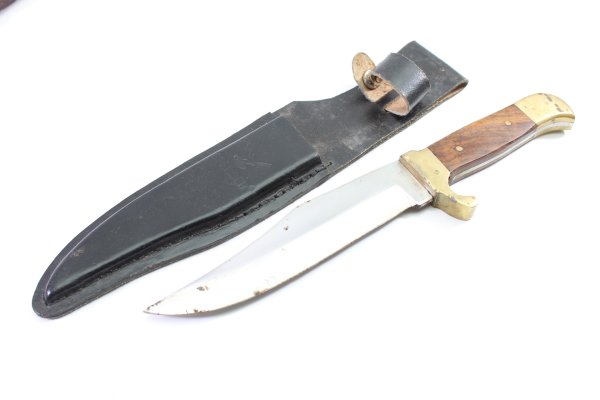 2 hunting knives, including a Mikov hunting knife in used condition