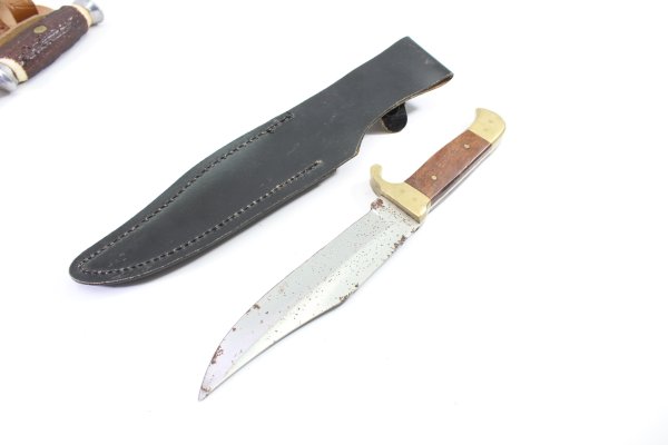 2 hunting knives, including a Mikov hunting knife in used condition