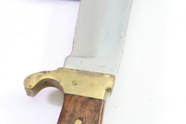 2 hunting knives, including a Mikov hunting knife in used condition