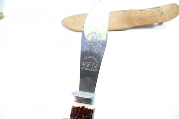 2 hunting knives, including a Mikov hunting knife in used condition