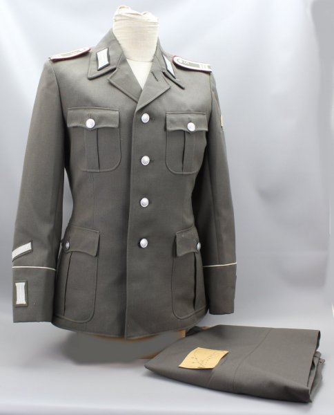 Early NVA / GDR uniform jacket guard regiment "Feliks Dzierzynski" Stasi officer students in the 3rd year of study including trousers