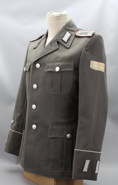 Early NVA / GDR uniform jacket guard regiment "Feliks Dzierzynski" Stasi officer students in the 3rd year of study including trousers