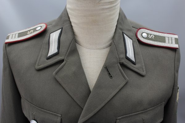 Early NVA / GDR uniform jacket guard regiment "Feliks Dzierzynski" Stasi officer students in the 3rd year of study including trousers