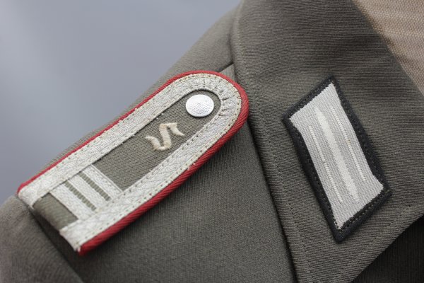 Early NVA / GDR uniform jacket guard regiment "Feliks Dzierzynski" Stasi officer students in the 3rd year of study including trousers