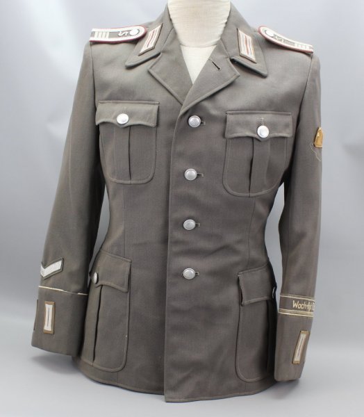Early NVA / GDR uniform jacket guard regiment "Feliks Dzierzynski" Stasi officer students in the 4th year of study
