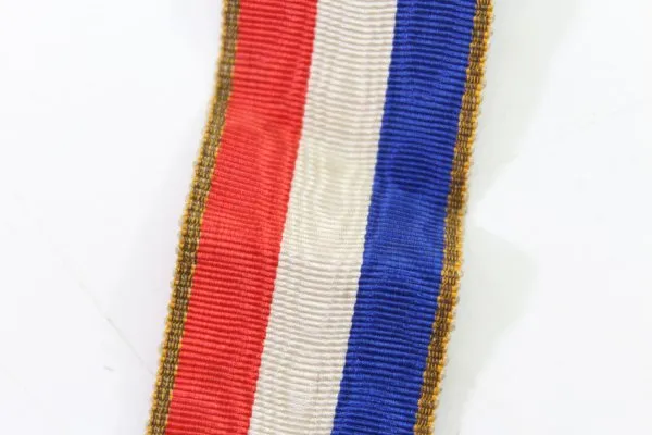 Original contemporary French national ribbon, blue, white, and red.