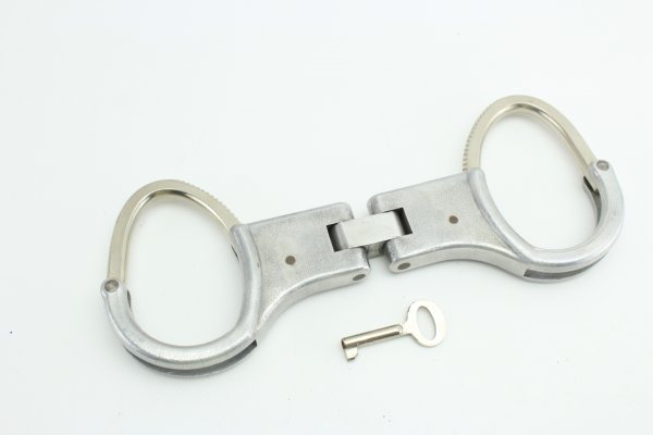 NVA Police MfS - handcuffs with a key, marked 333.
