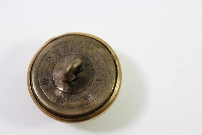 Metall Knöpfe einer Uniformschneiderei, Kopf Uniform