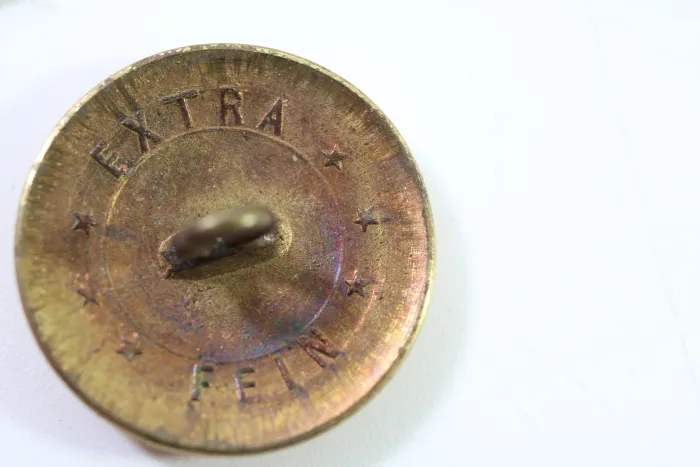 Metall Knöpfe einer Uniformschneiderei, Kopf Uniform