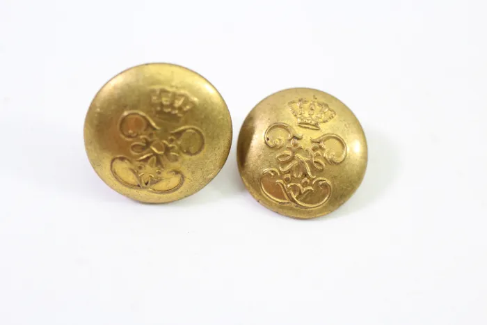 Metal buttons from a Silesian uniform tailor