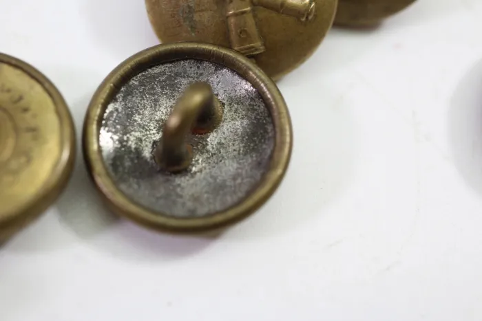 Metal buttons from German uniform tailor
