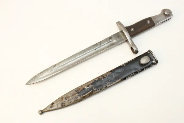 Bayonet with manufacturer marking and numbering on the grip