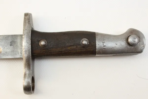 Bayonet with manufacturer marking and numbering on the grip