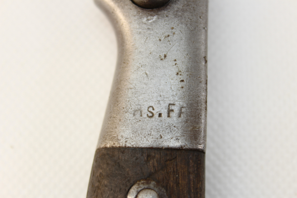 Bayonet with manufacturer marking and numbering on the grip