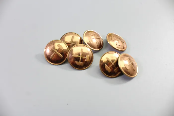 Metall Knöpfe einer Uniformschneiderei, Kopf Uniform