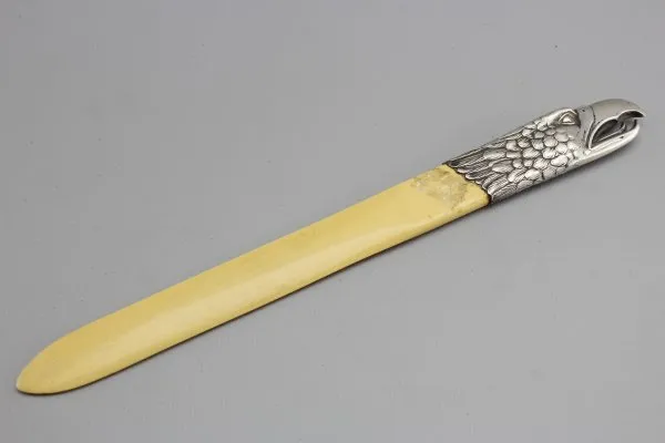 Newspaper turner / letter opener made of bone with silver fittings 800 silver from the estate of an adjudant