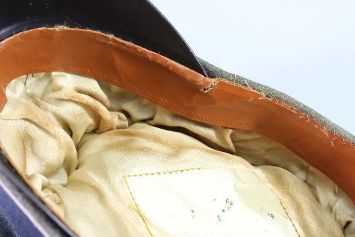 Early peaked cap for infantry officers, so-called "crumpled cap," circa 1940.