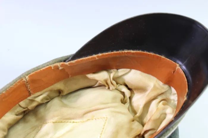 Early peaked cap for infantry officers, so-called "crumpled cap," circa 1940.