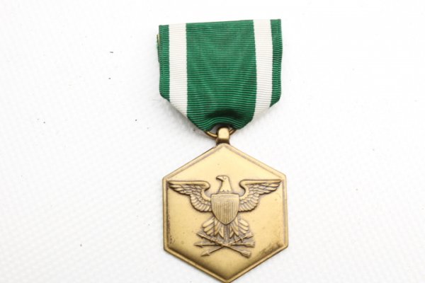 US Army medal "FOR MILITARY - MERIT" on the green ribbon