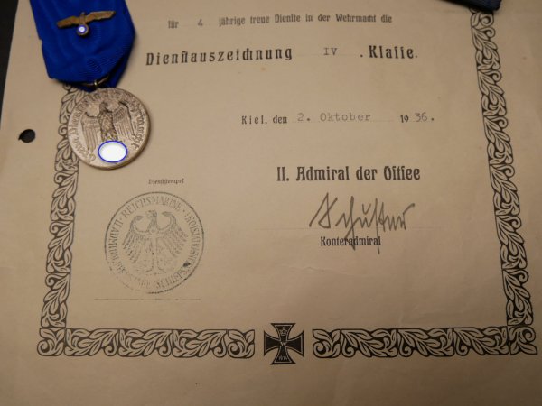 Kriegsmarine certificate + medal - service award for 4 years of loyal service on a ribbon + field clasp