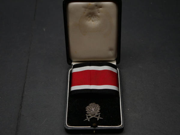 Oak leaves with swords to the Knight's Cross of the Iron Cross on a ribbon in an LDO case