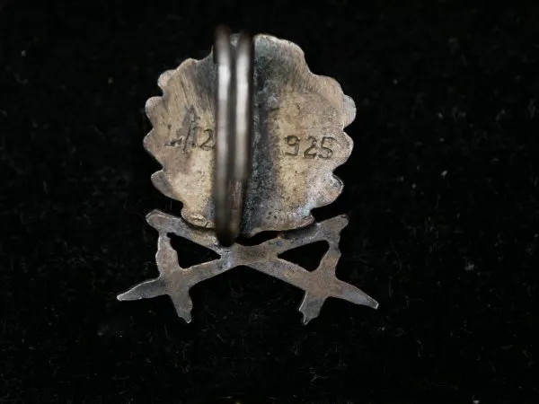 Oak leaves with swords to the Knight's Cross of the Iron Cross on a ribbon in an LDO case