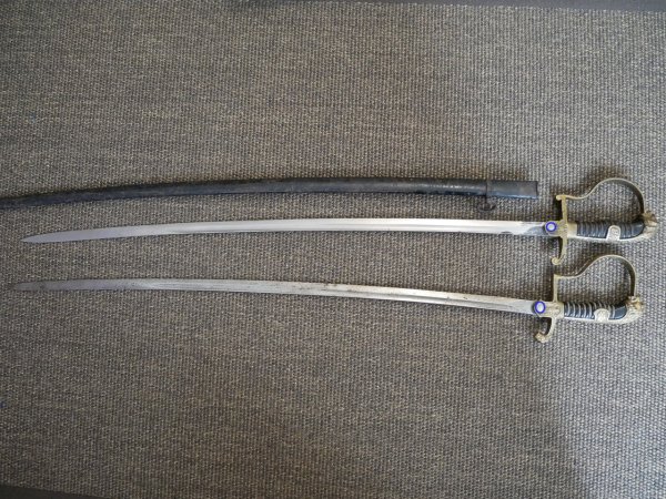 Two lion-head officer's sabers, WWII.
