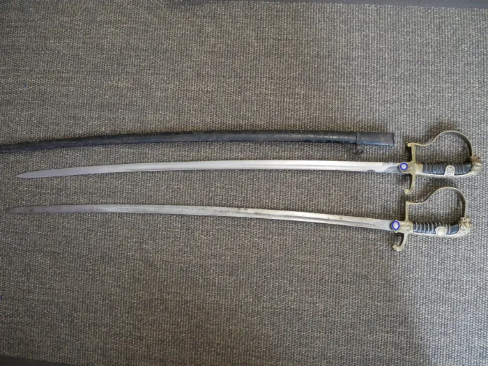 Two lion-head officer's sabers, WWII.