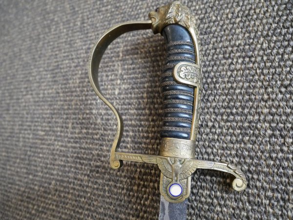 Two lion-head officer's sabers, WWII.