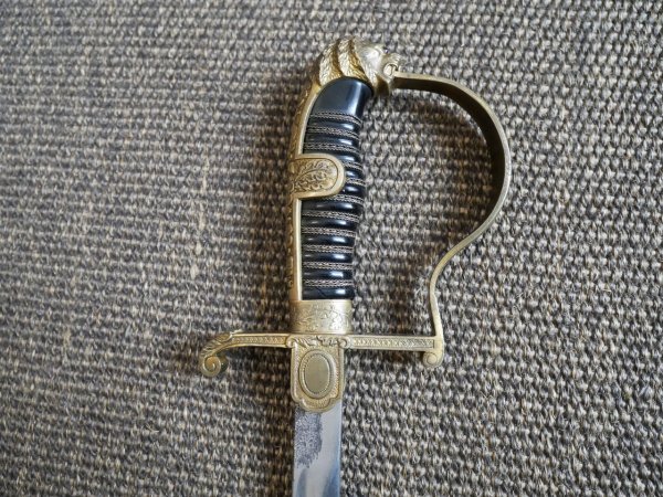 Two lion-head officer's sabers, WWII.