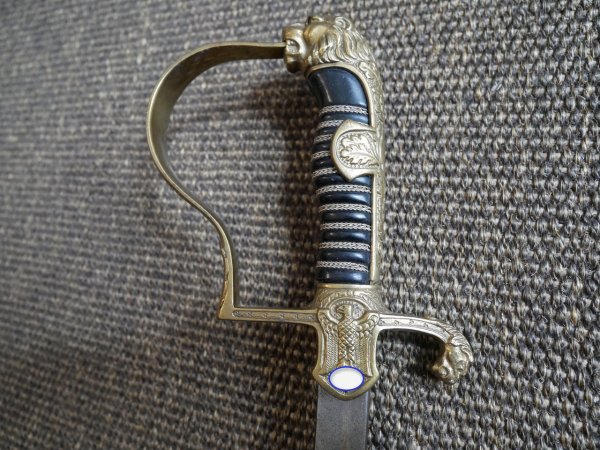 Two lion-head officer's sabers, WWII.