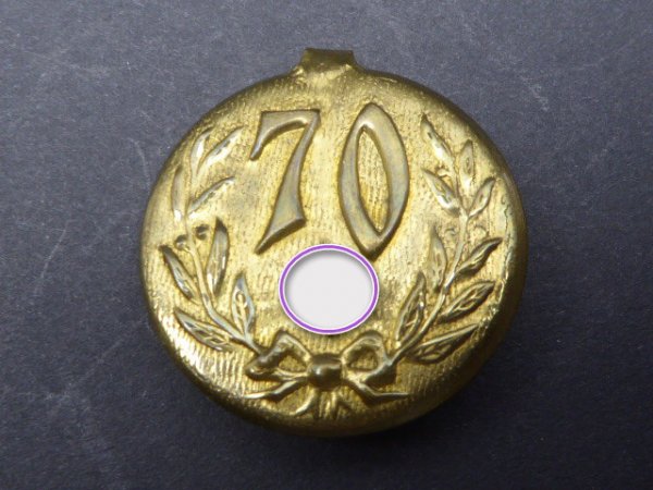 Badge "70" with HK