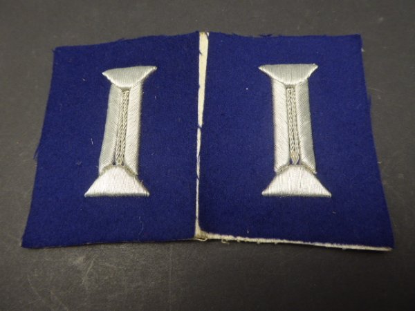 A pair of sleeves - flaps, gun color blue from a tailor's estate, unsewn