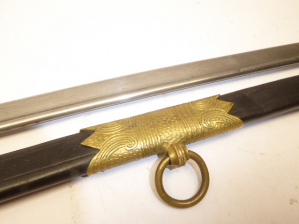 Saber of the Imperial Navy with Damascus blade, manufacturer WKC, personified by Dr. Romans