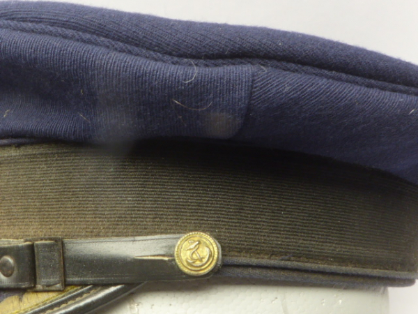 GDR KVP NVA visor cap for officers of the VP at sea + naval forces / Volksmarine with manufacturer Emhage Berlin