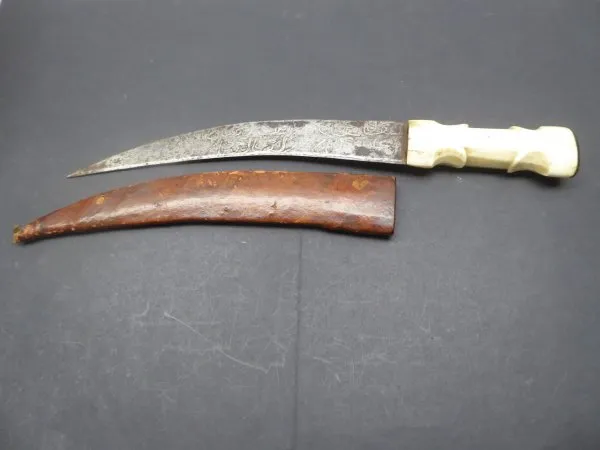 Old oriental dagger / card with blade etching and bone handle