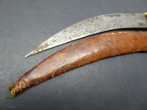 Old oriental dagger / card with blade etching and bone handle